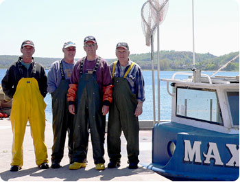 Gary, Dave, Paul and Jerry VanLandschoot are proud of their trap net boat Max B